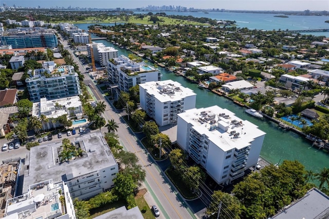bird's eye view featuring a city view and a water view