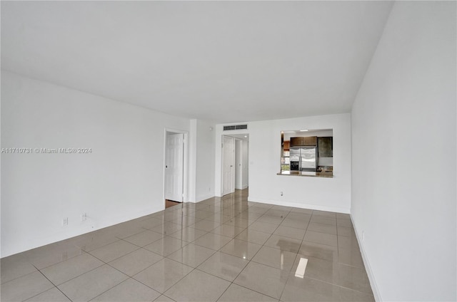 spare room featuring tile patterned floors