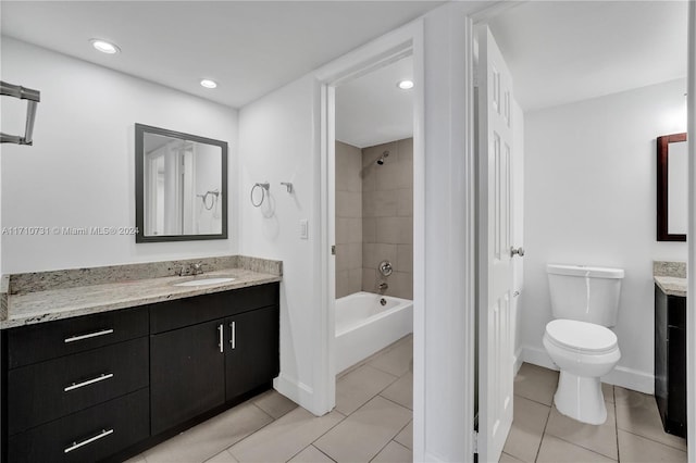 full bathroom with tile patterned flooring, vanity, and toilet