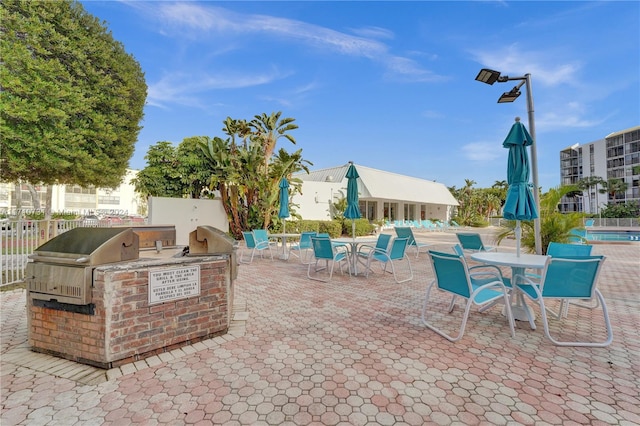 view of patio / terrace featuring exterior kitchen and grilling area