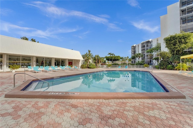 view of swimming pool featuring a patio