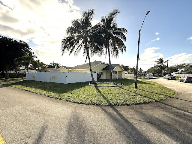 view of front of property with a front lawn