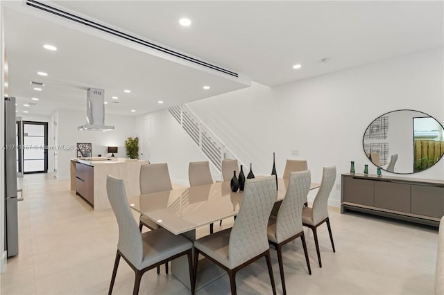 909 NE 16th Ave, Fort Lauderdale, FL 33304 - dining area with recessed lighting and stairway