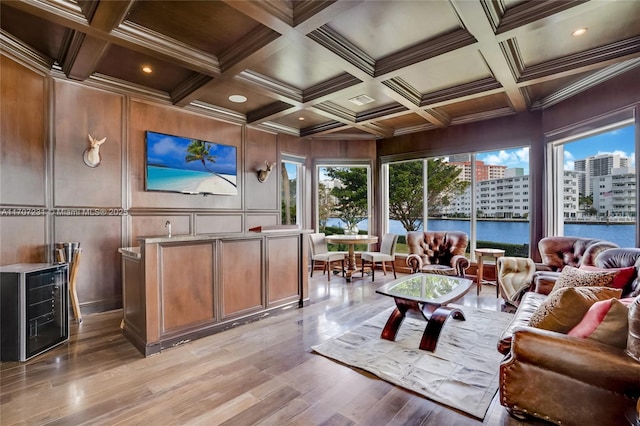 sunroom / solarium with coffered ceiling, beam ceiling, and beverage cooler