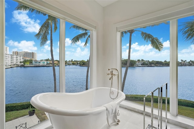 sunroom with a water view