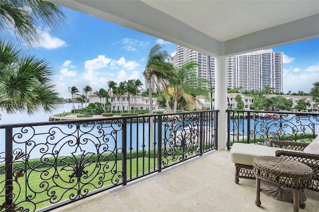 balcony featuring a water view