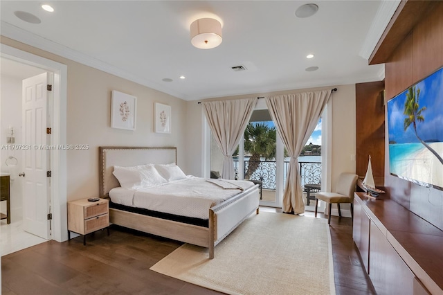 bedroom with access to exterior, ornamental molding, and dark hardwood / wood-style floors