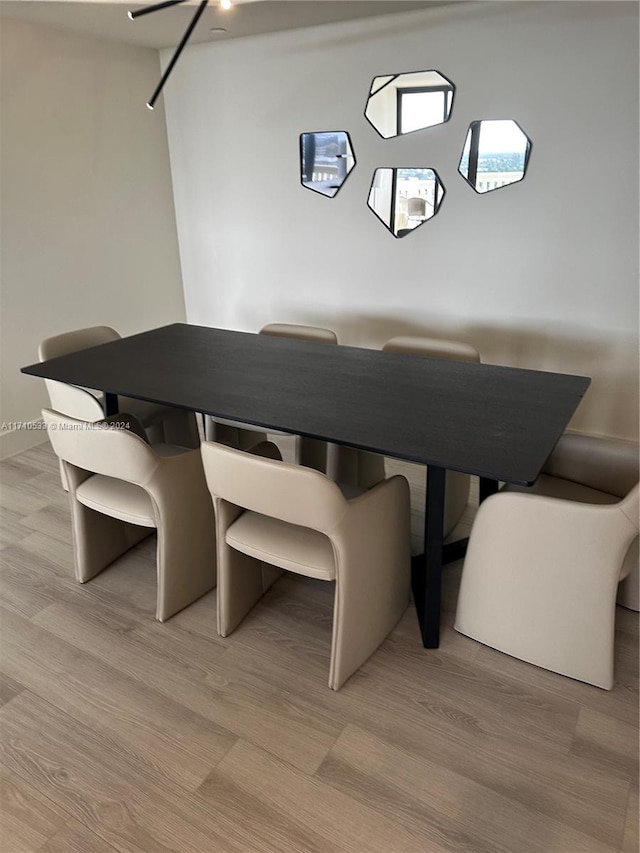 dining space featuring light hardwood / wood-style flooring