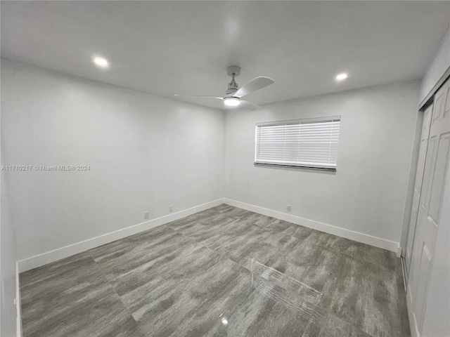 unfurnished room featuring wood-type flooring and ceiling fan