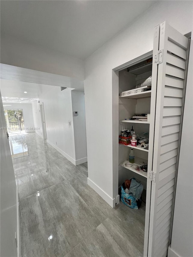 corridor featuring light hardwood / wood-style flooring