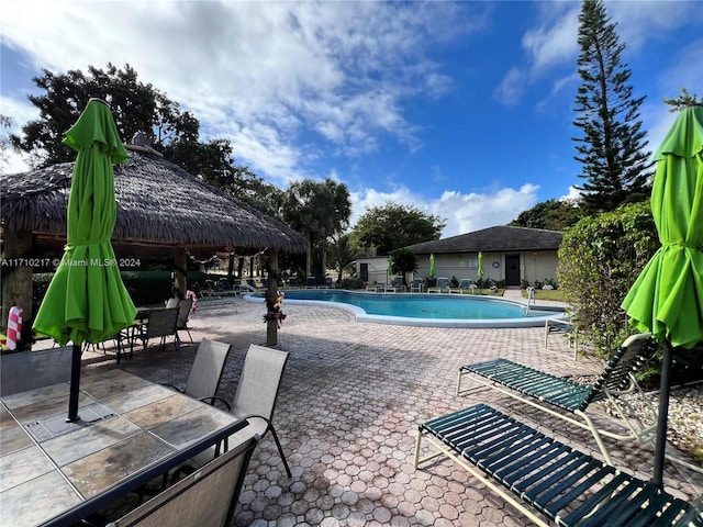 view of pool with a gazebo and a patio