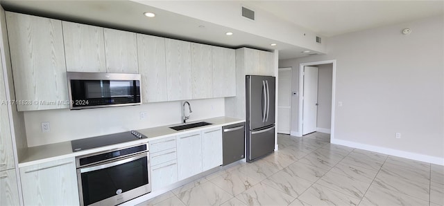 kitchen featuring sink and stainless steel appliances