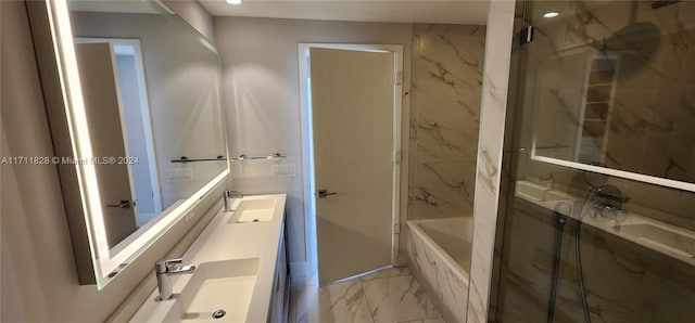 bathroom featuring vanity and shower with separate bathtub