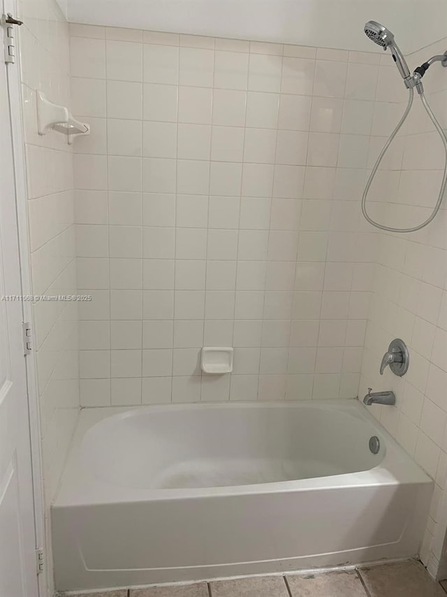 6169 Metrowest Blvd Unit 104, Orlando, FL 32835 - full bathroom featuring tile patterned flooring and bathtub / shower combination