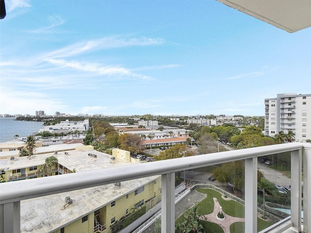 balcony featuring a water view