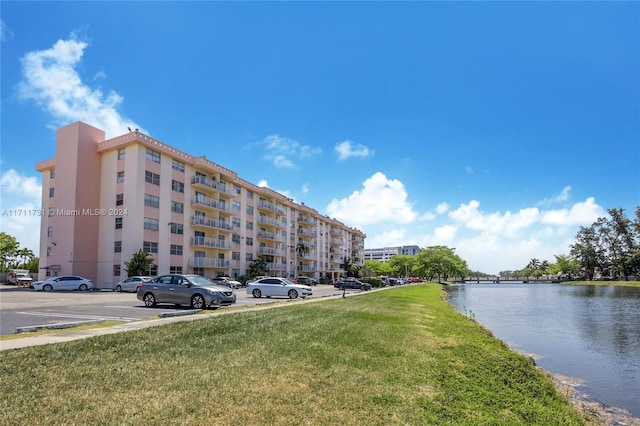 view of property with a water view