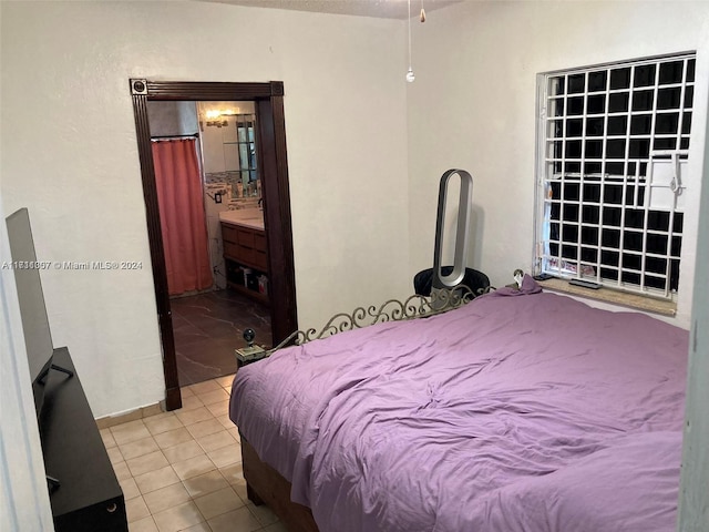 bedroom featuring tile patterned floors