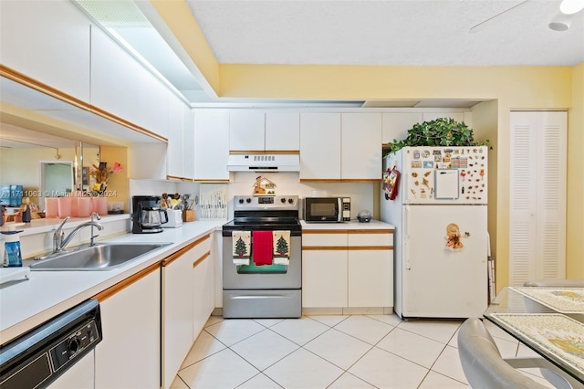 kitchen featuring white appliances, ventilation hood, sink, light tile patterned flooring, and white cabinetry