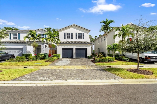 view of front of home with a garage