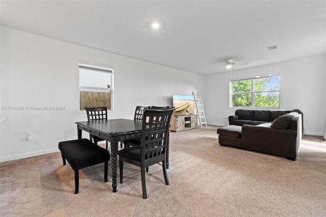 view of carpeted dining area