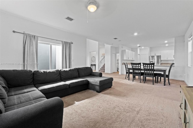 living room with light carpet