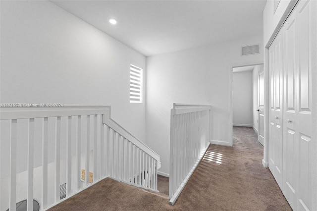 hallway featuring carpet floors