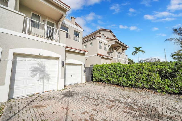 exterior space with a garage