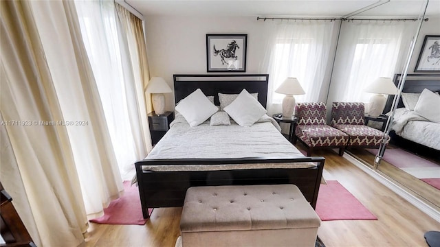 bedroom featuring wood-type flooring