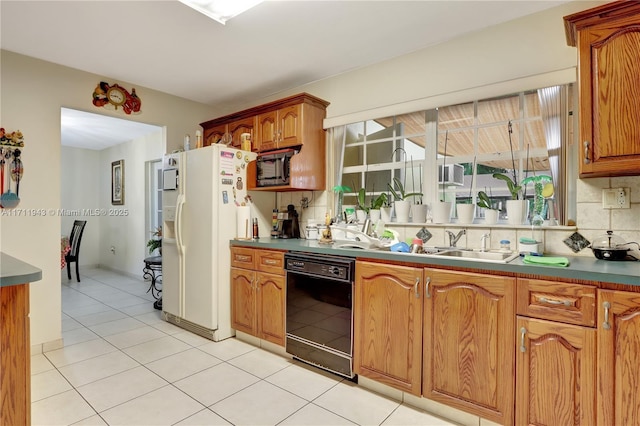 kitchen with dishwasher, white fridge with ice dispenser, built in microwave, and light tile patterned floors