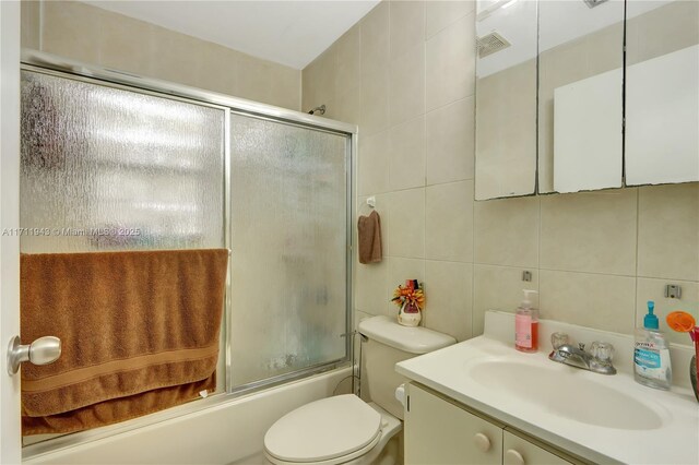 tiled bedroom featuring a closet and ceiling fan