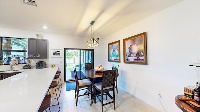 dining space featuring sink