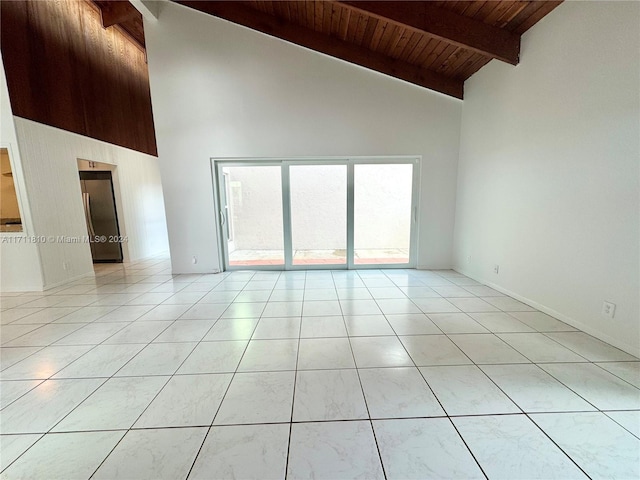 unfurnished room featuring beam ceiling, high vaulted ceiling, wooden ceiling, and light tile patterned floors