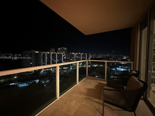 view of balcony at twilight