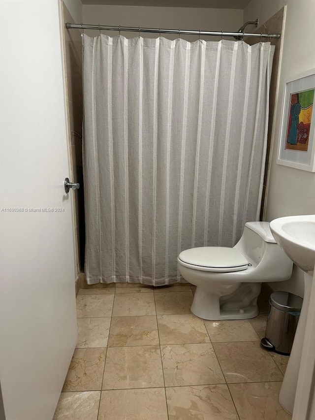 bathroom featuring toilet