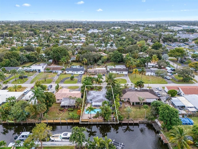 bird's eye view with a water view