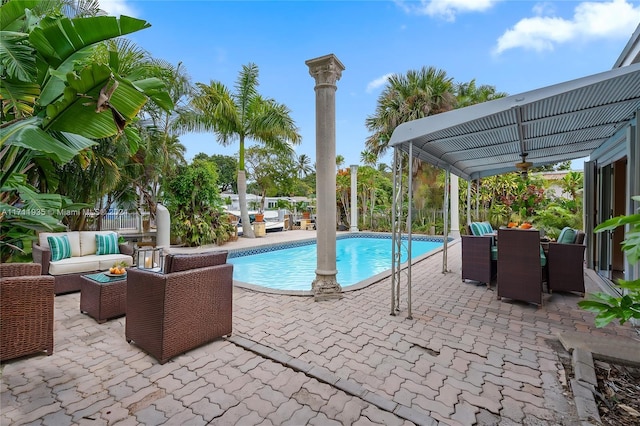 view of swimming pool featuring a patio area and an outdoor hangout area