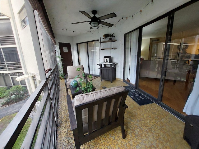 balcony featuring ceiling fan