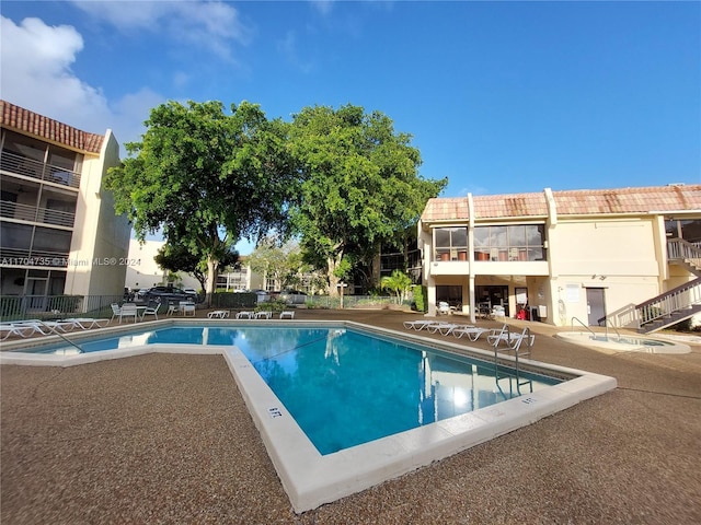 view of swimming pool featuring a patio