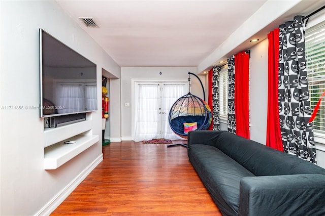 living room with wood-type flooring