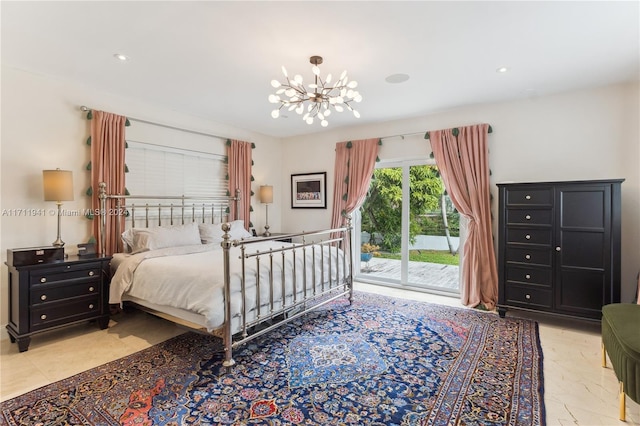 bedroom with access to outside and a notable chandelier