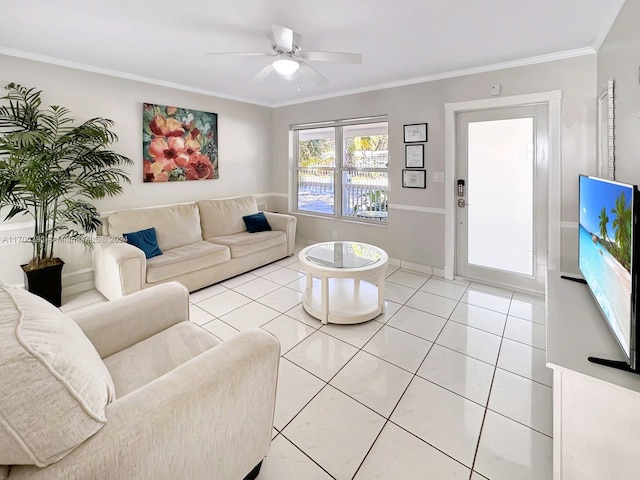 living room with ceiling fan, light tile patterned floors, and ornamental molding