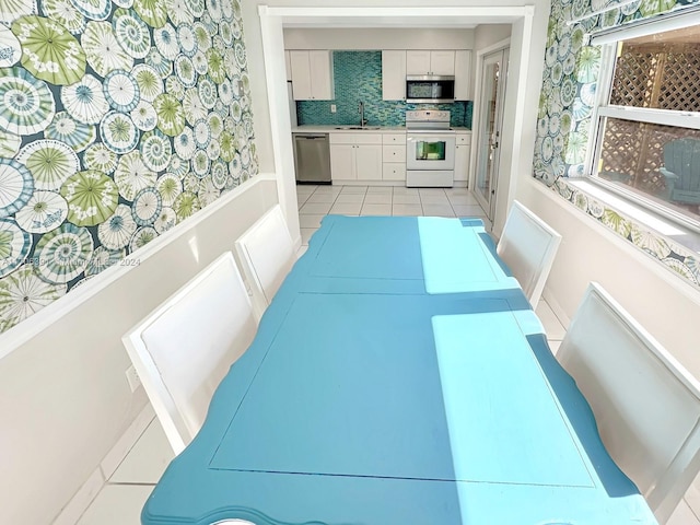 1820 SW 11th Ct, Fort Lauderdale, FL 33312 - dining room with light tile patterned floors