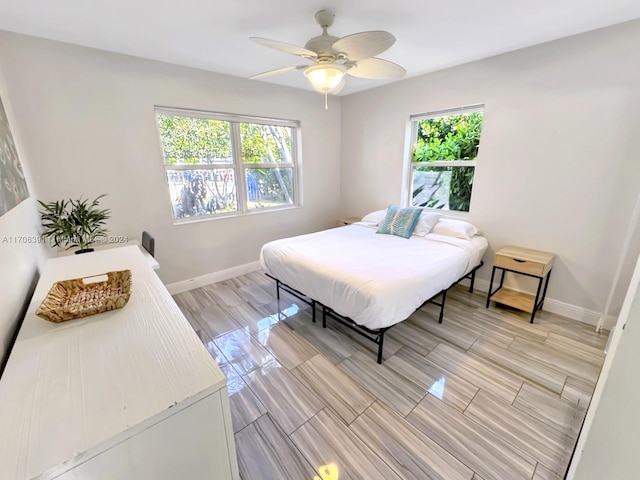 1820 SW 11th Ct, Fort Lauderdale, FL 33312 - bedroom featuring a ceiling fan and wood tiled floors