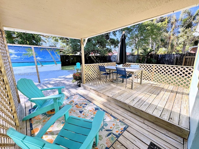1820 SW 11th Ct, Fort Lauderdale, FL 33312 - wooden terrace featuring a fenced backyard and outdoor dining area