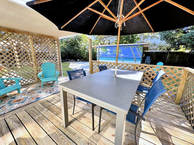 1820 SW 11th Ct, Fort Lauderdale, FL 33312 - wooden terrace with outdoor dining area