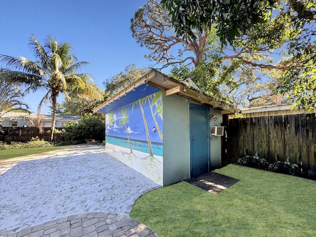 1820 SW 11th Ct, Fort Lauderdale, FL 33312 - view of outdoor structure with a fenced backyard and cooling unit