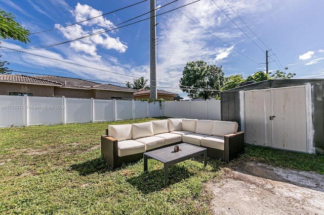 view of patio / terrace with a shed and an outdoor hangout area