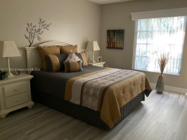 bedroom featuring light hardwood / wood-style floors