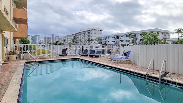 view of pool featuring a patio area