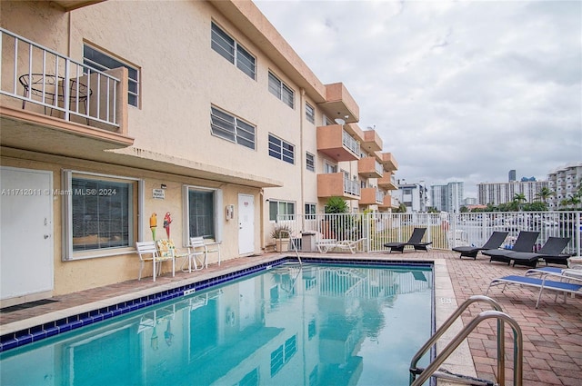 view of pool featuring a patio area